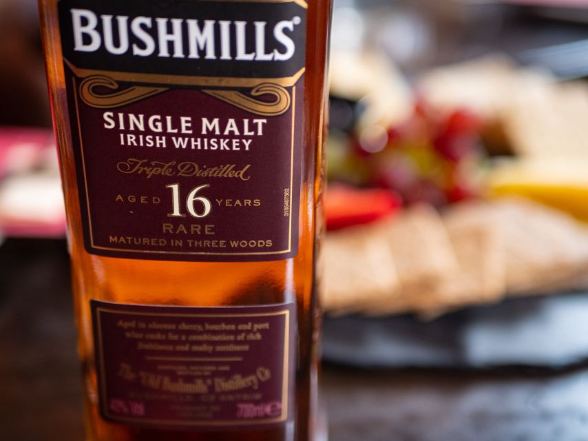 2-Hour Deluxe Whiskey & Food Tasting - Walking between two whiskey institutions