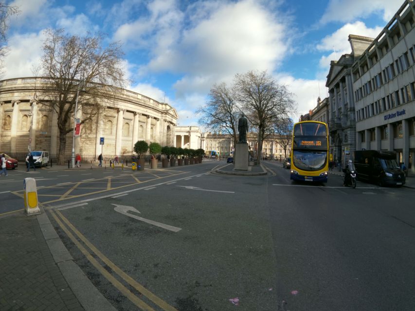 Dublin: Dublin City Highlights Private Guided Walking Tour - Crossing Ha’penny Bridge and College Green