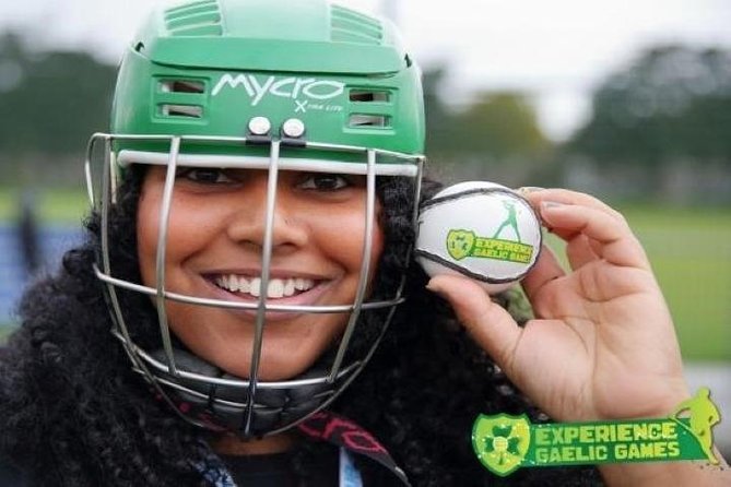 Experience Gaelic Games in Dublin - Trying hurling with a hurley in hand